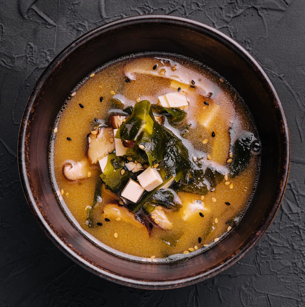 soup with algae and mushrooms top view